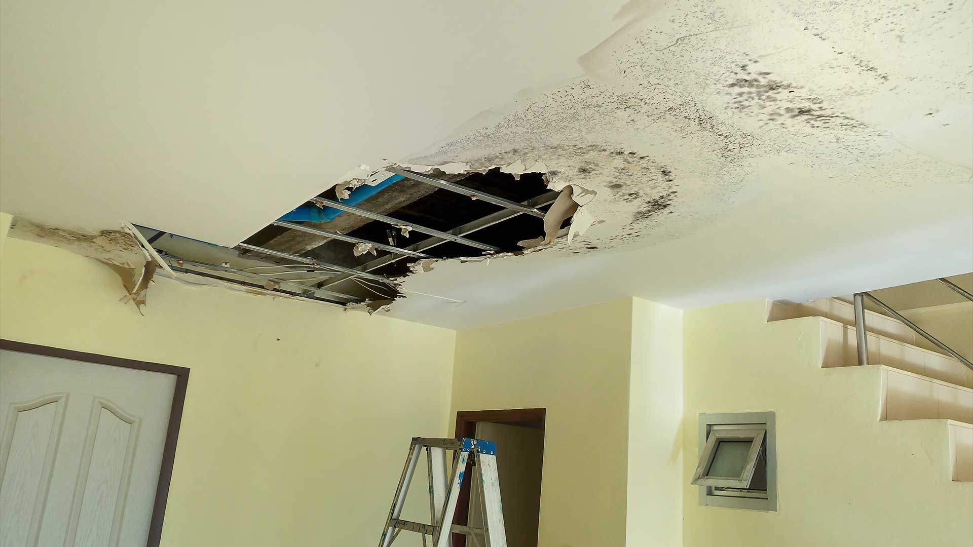 Interior damage from a roof leak